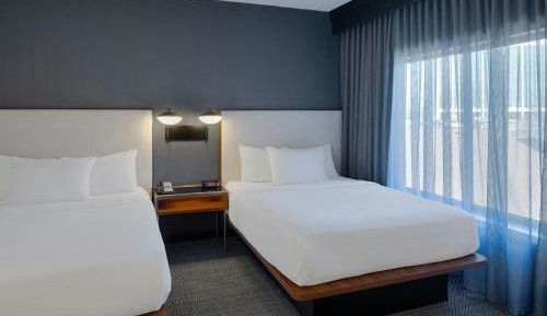 One-Bedroom Queen Suite with Two Queen Beds and Sofa Bed