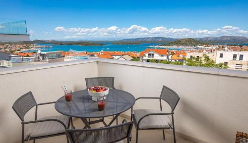 One-Bedroom Apartment with Balcony and Sea View