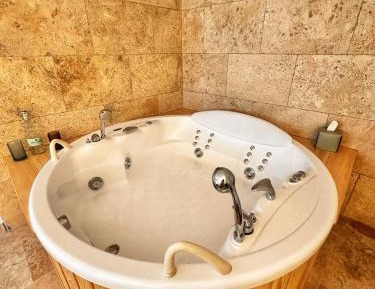 Junior Suite Triple (2 adults + 1 child) with Jacuzzi Breakfast included