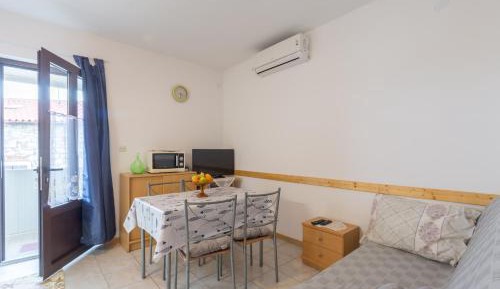 One-Bedroom Apartment with Balcony and Sea View