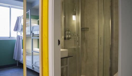 Bed in 8-Bed Female Dormitory Room with Private Bathroom