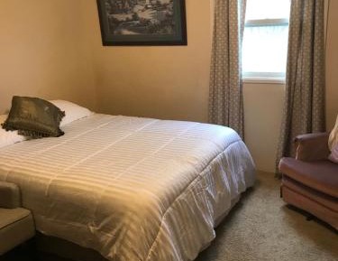 Queen Room with Shared Bathroom