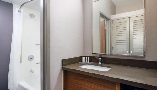 One Bedroom Suite with Two Double Beds and a Sofa Bed