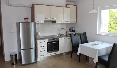 Two-Bedroom Apartment with Balcony & Sea View 