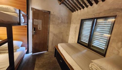 Single Bed in Dormitory Room