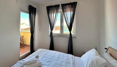 Two-Bedroom Apartment with Balcony and Sea View