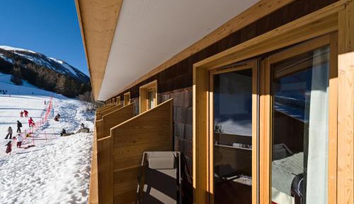 Family Room with Ski Slopes View and Balcony