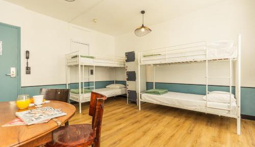 Bed in 4-Bed Female Dormitory Room with Shared Bathroom