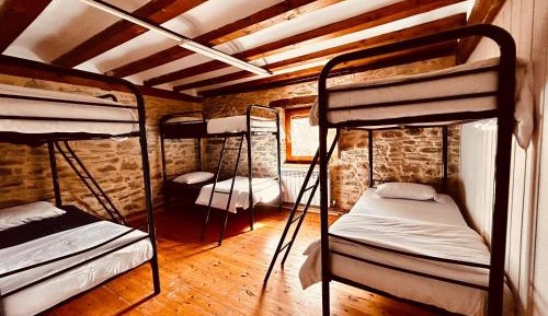 Single Bed in Dormitory Room