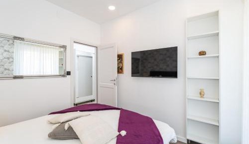 One-Bedroom Apartment with Balcony and Sea View