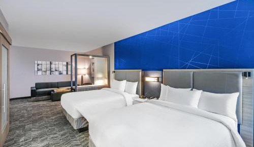 Queen Suite with Two Queen Beds, Landscape View and Trundle Sofa