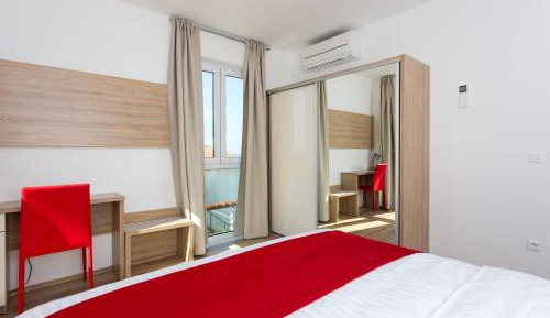 One-Bedroom Apartment with Balcony and Partial Sea View