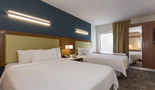 Queen Suite with Two Queen Beds and Sofa Bed