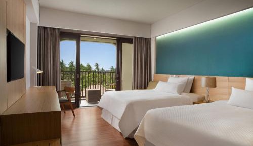 Deluxe Room, Guest room, 2 Twin/Single Bed(s), Garden view, Balcony with Daily Shuttle to Monkey Forest, Daily Yoga, Free Bike to borrow,  Free Family Activity and 24 Hour access to Motion Fitness Center