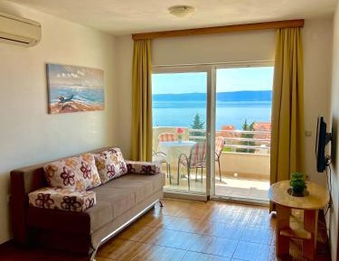 One-Bedroom Apartment with Balcony and Sea View