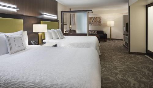 Larger Queen Suite with Two Queen Beds and Trundle Sofa