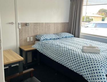 Queen Room with Shared Bathroom