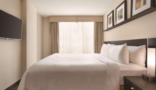 Two-Bedroom Presidential Suite with One King Bed and Two Double Beds