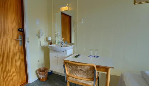 Double Twin Room with private toilet and bath opposite room