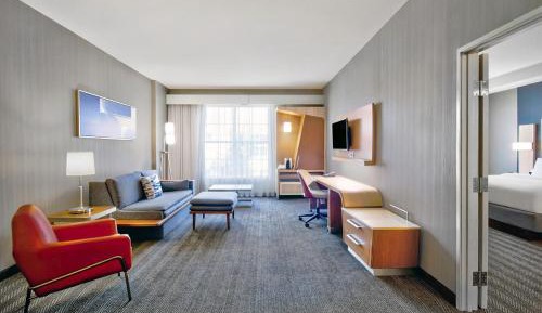 One-Bedroom King Suite with Courtyard View and Sofa Bed