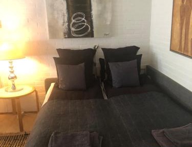 Family Room with Shared Bathroom (5 Adults)