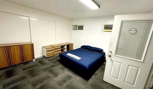 Queen Room with Shared Bathroom