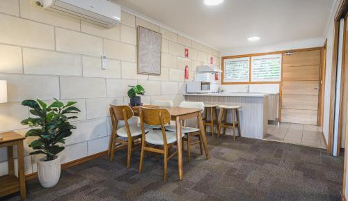 Partial ocean view family with kitchen