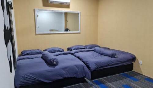 Quadruple Room with Shared Bathroom