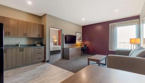 One-Bedroom King Suite with Sofa Bed, Kitchenette, and Spa Bath