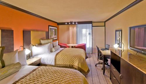 One Bedroom Suite with Two Double Beds and Sofa Bed - Non-Smoking