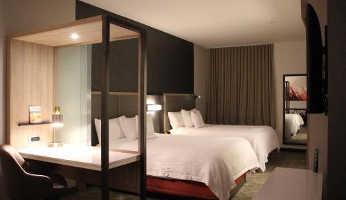 Queen Suite with Two Queen Beds and Sofa Bed