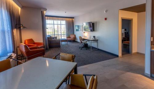 One-Bedroom King Suite with Dining Area, Sofa Bed and Living Room
