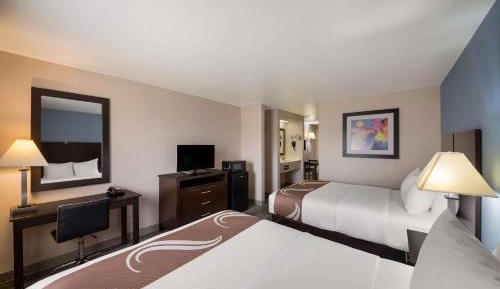 Queen Suite with Two Queen Beds and Sofa Bed