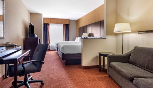 Queen Suite with Two Queen Beds and Sofa Bed