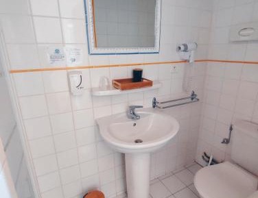 Quadruple Room with Private Bathroom