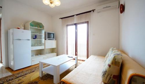 One-Bedroom Apartment with Balcony and Sea View