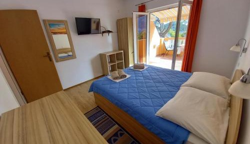 One-Bedroom Apartment with Balcony and Sea View