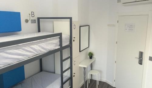 Bed in 4-Bed Female Dormitory Room with External Bathroom