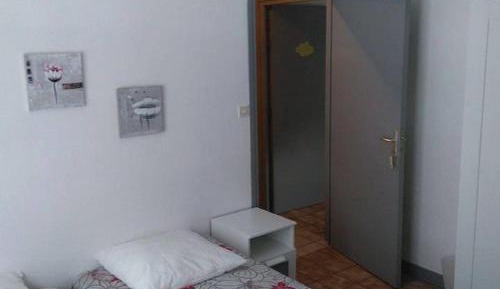 Quadruple Room with Shared Bathroom
