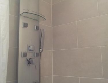 Triple Room Mezzanine with Balcony and Courtyard View