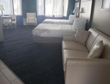 Deluxe Queen Suite with Two Queen Beds & Sofa Bed