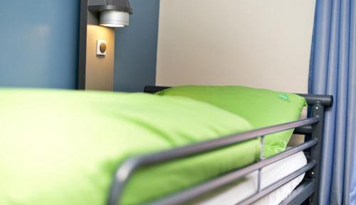 Bunk Bed in Male Dormitory Room with Shared Bathroom