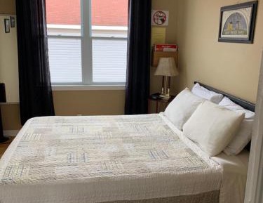 Queen Room with Shared Bathroom