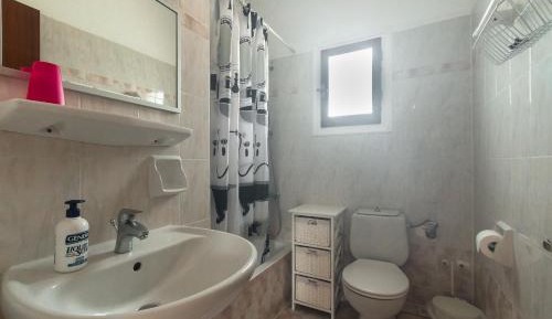 One-Bedroom Apartment with Balcony and Sea View