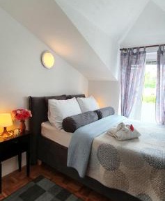 One-Bedroom Apartment with Balcony and Sea View