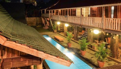 Wooden House with Balcony and Sea View