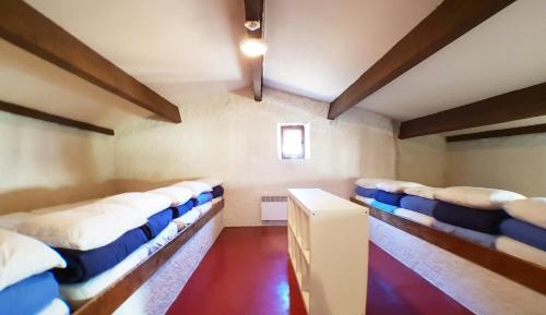 Single Bed in Dormitory Room