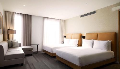 Connecting Room with One King Bed and Two Queen Beds