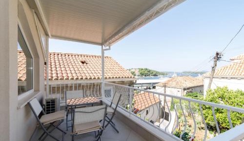 One-Bedroom Apartment with Balcony and Sea View