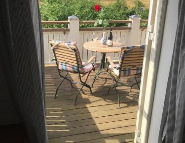 Three Connected Rooms with Private Bathroom, a Terrace and access to Shared Kitchen